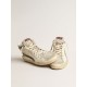 Slide in beige nappa with green laminated leather star and flash