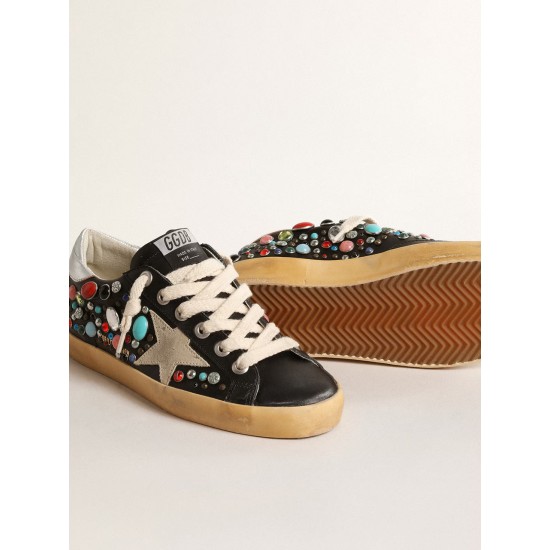 Super-Star LTD with multicolored studs and beige suede star