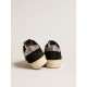 Women’s Hi Star in black leather with silver glitter heel tab